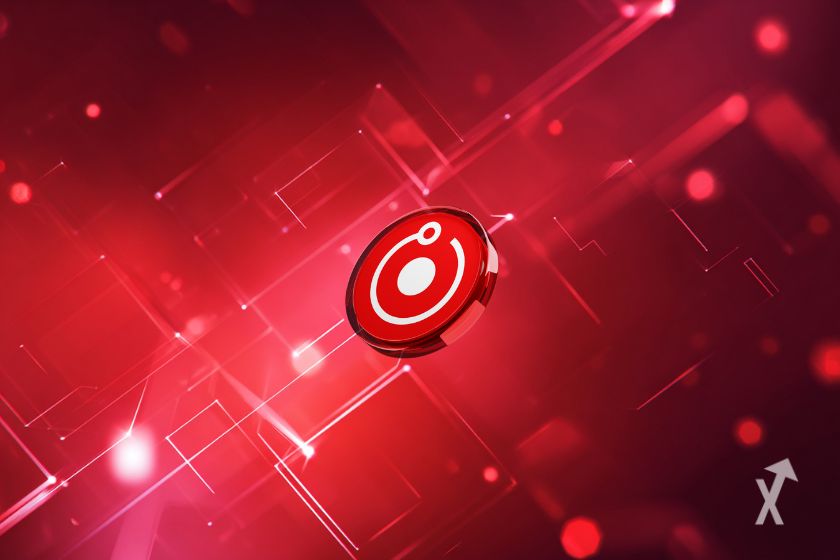 Roter RNDR Token auf grünem Hintergrund.