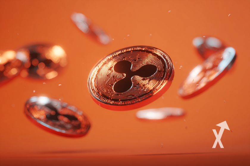 plusieurs xrp coin sur un fond orange