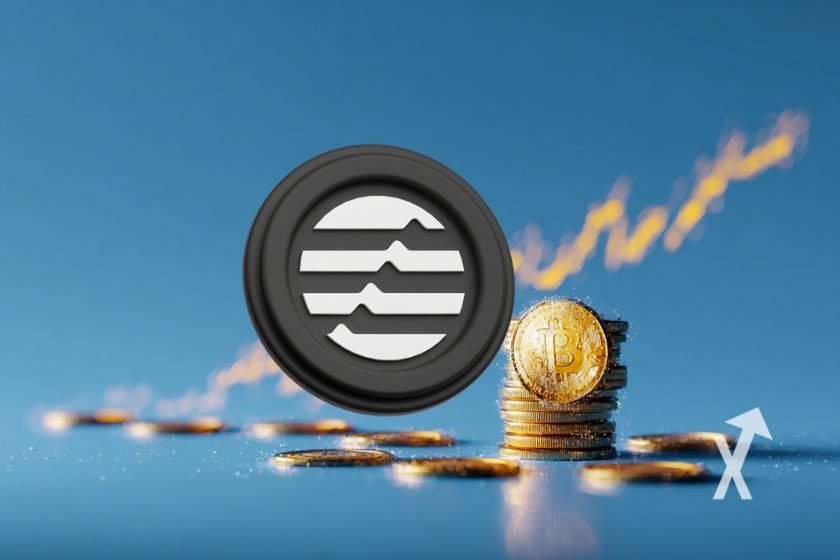 coin aptos sur un fond bleu avec trendline aune qui monte et des coins empil&eacute;s