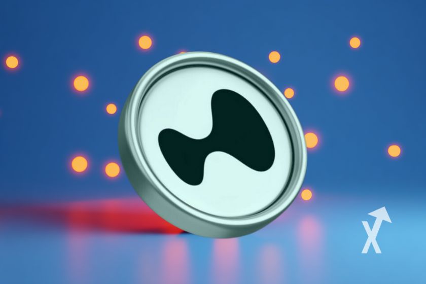 Coin with liquid effect on blue background with yellow dots.