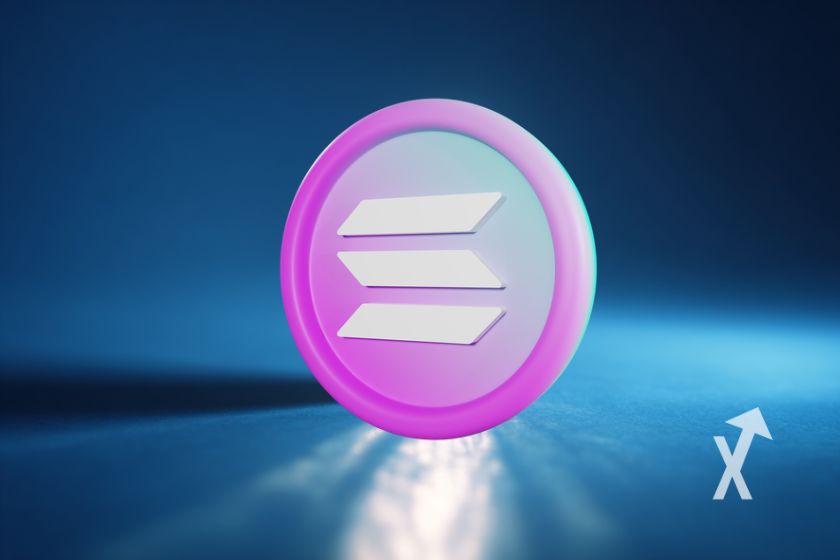 Pink Solana token on blue background with white light from behind.