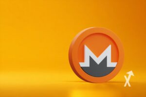 "XMR Monero coin on orange background"