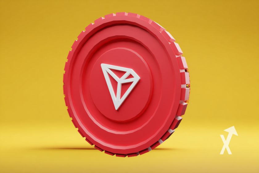 coin TRON rouge sur un fond jaune