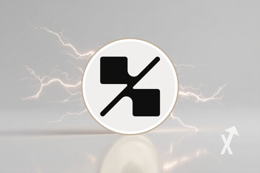 Token YB de YieldBasis, fondo gris.