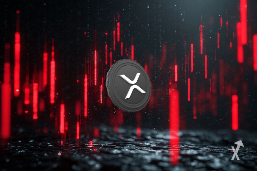 Token XRP con velas rojas.
