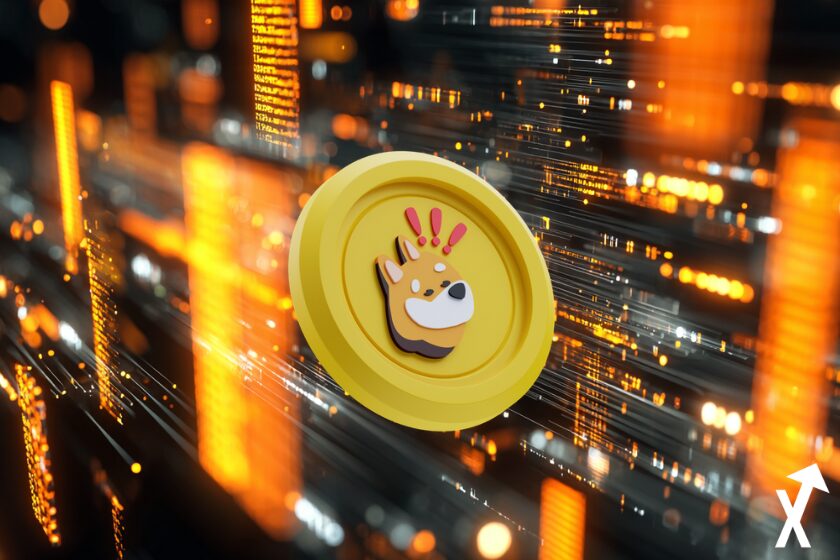 Criptomoneda naranja en gráfico de trading.