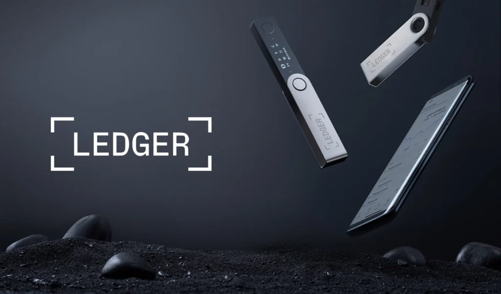 Un banner con el logo Ledger sobre un fondo gris y llaves de seguridad a la derecha
