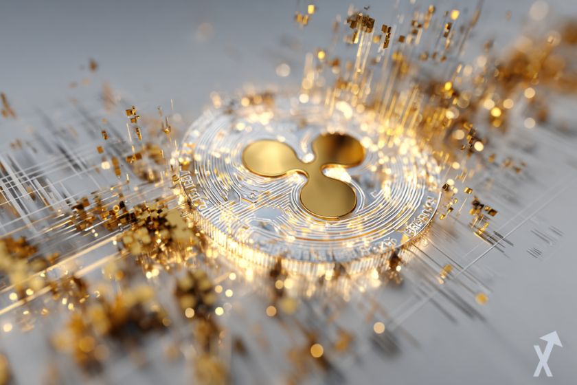 Moneda XRP dorada en humo gris.