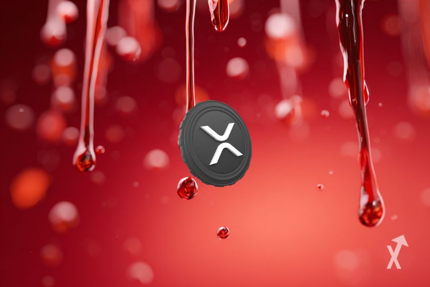 Token XRP gris sobre fondo rojo.