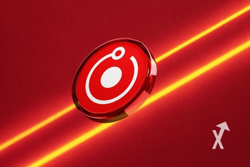 Moneda virtual RNDR en fondo rojo.