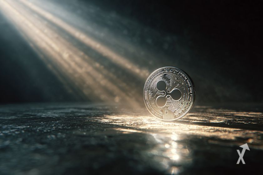 Moneda plata logo XRP reflejada luz.