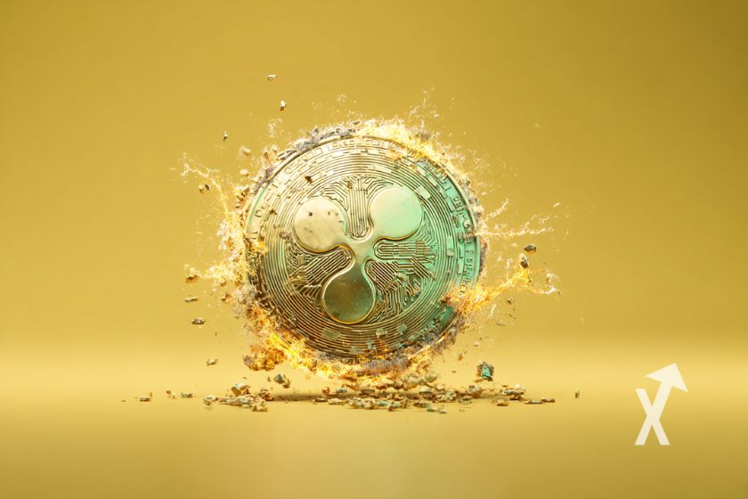 Moeda XRP amarela em fundo amarelo.