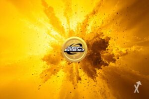 Um token amarelo com logotipo SPX.