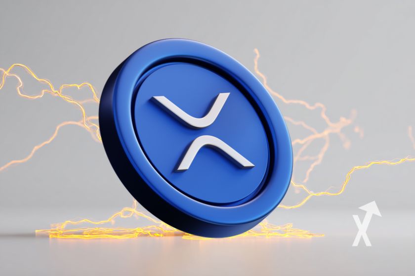 coin 3D du XRP en bleu avec étincelles autour et un fond gris/blanc