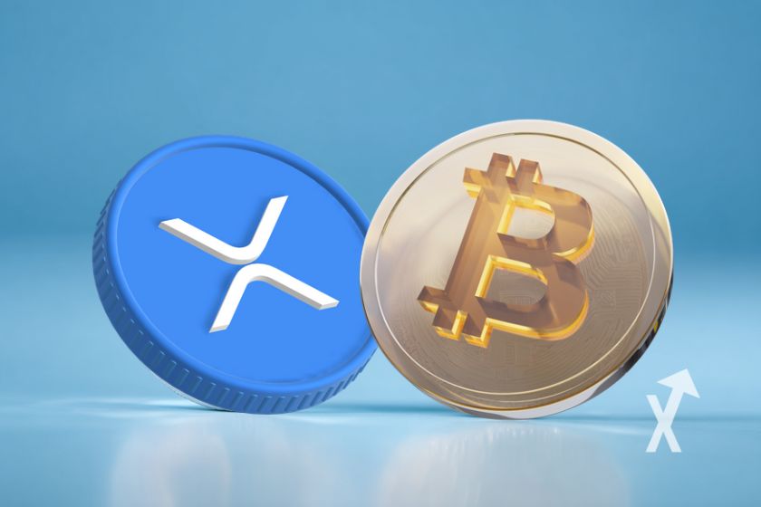 coin XRP en bleu et coin Bitcoin en gris sur un fond bleu
