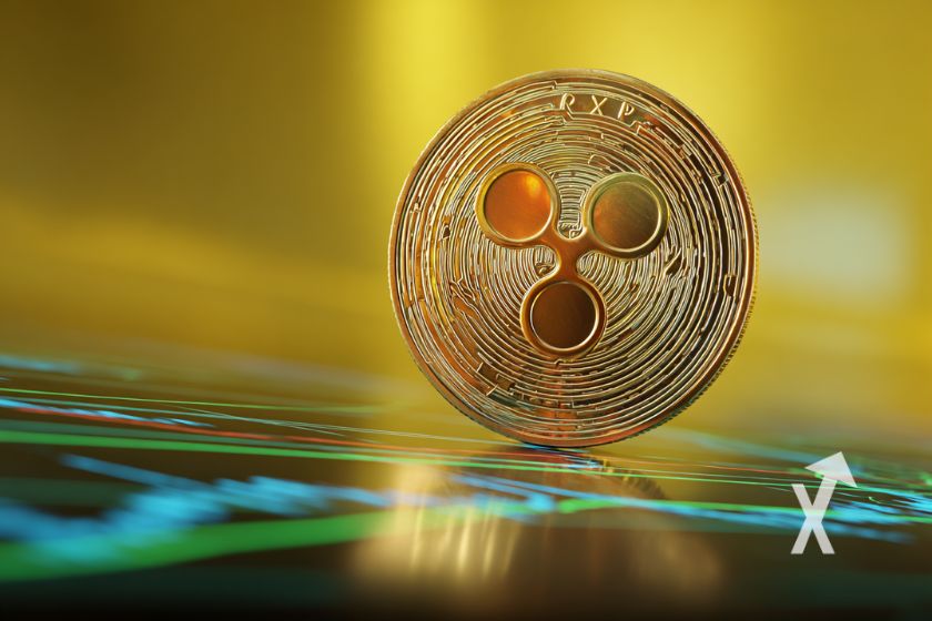 xrp coin sur un fond jaune avec lignes bleues écran au sol